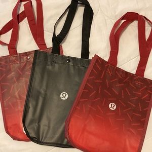 Set of three Lululemon bags, recyclable.